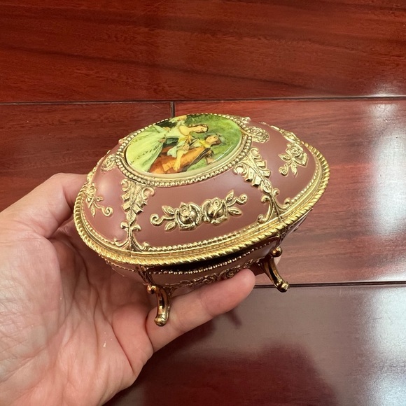 Vintage Sankyo Gold Tone Enamel Footed Egg Shape Trinket Music Box